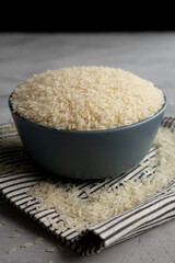 Dry Jasmine Rice in a Bowl, side view. Close-up.