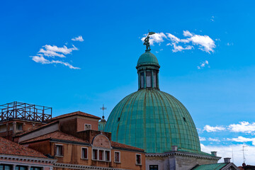 Old town of Venice with dome of church San Simeon Piccolo on a blue cloudy summer day. Photo taken...