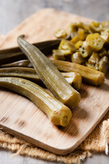 Okra slices on wooden table. Close up
