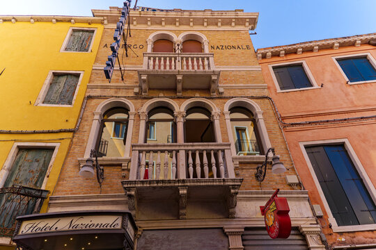 Old town of Italian City of Venice with facade of Nazionale Hotel on a sunny summer day. Photo taken August 6th, 2023, Venice, Italy.