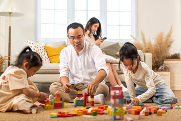 Portrait of enjoy happy love asian family father and mother with little asian girl smiling activity...