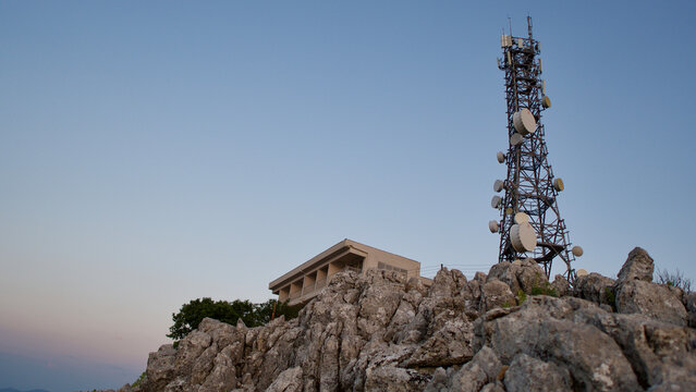 Radar and mobile phone signal station. Radio and satellite signal antenna installed on rocky mountain peak. Iztuzu radar station.