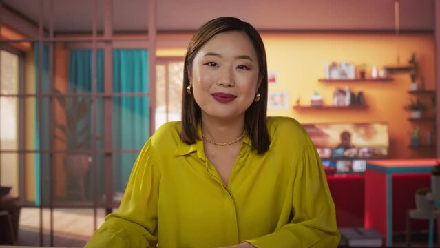 Portrait of Attractive Asian Young Female Making Video Call from Home. Happy Woman Talking to Family and Friends Online, Smiling and Having Interesting Conversation. Camera POV. Screen Replacement
