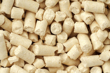 Wooden filler for cat litter close up for background