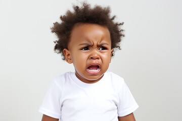 Black African American little baby toddler crying wearing white T-shirt