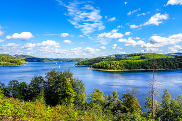 View of the Biggesee near Attendorn in the Olpe district with the surrounding nature. Landscape by the lake in the Sauerland. Bigge Dam.
