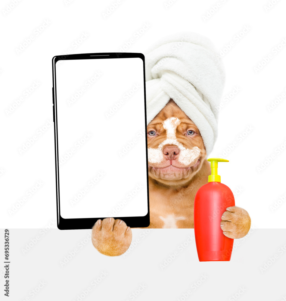 Poster mastiff puppy with towel on it head, with cream on it face holds bottle of fleas shampoo and big sma