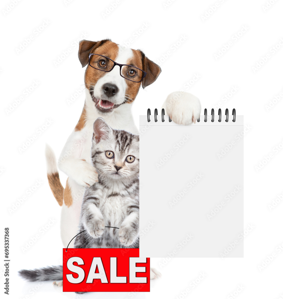 Aufkleber Smart Jack russell terrier puppy hugs tabby kitten and shows empty list. Cat shows signboard with labeled 