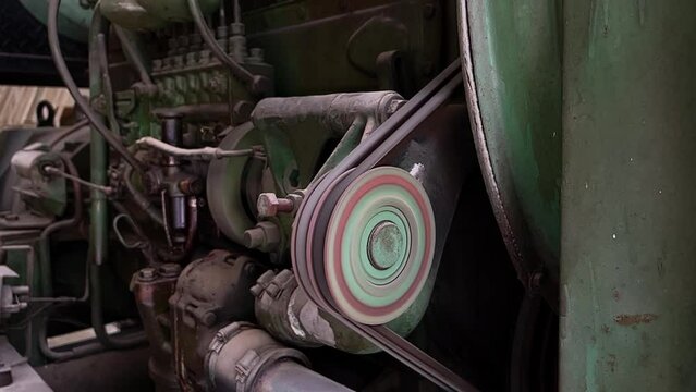 Slow motion of V Belts Running. Working Belt drive mechanism of dirty engine.