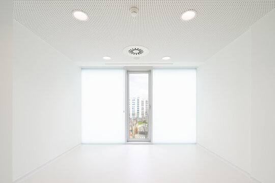 Empty white room with window in hospital