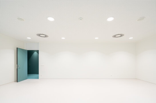 White room with open door in hospital