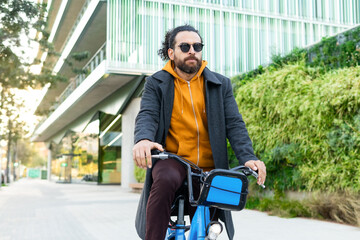 Urban commuter riding a bicycle in the city