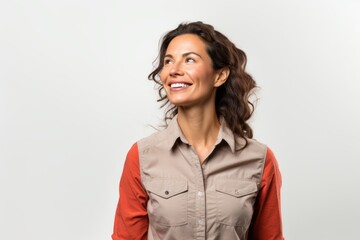 Portrait of a tender woman in her 30s sporting a breathable hiking shirt against a white background. AI Generation