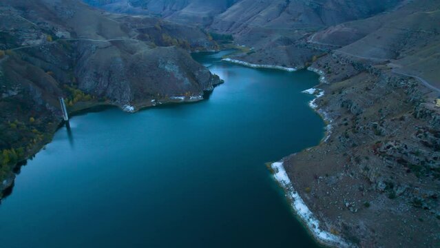 Mountain lake with blue water in a picturesque gorge. Landscape and nature of the North Caucasus