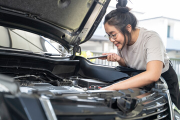 Need help with car breakdown Serious woman listens to advice and explanation of emergency car...