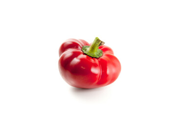 Whole red bell pepper isolated on white background with clipping path. .