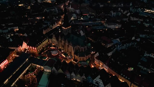 christmas market. Christmas lights of the city of Osnabrück in Germany. Aerial photography. Night city