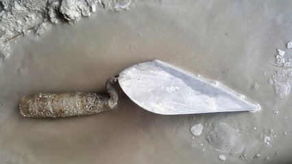 close-up trowel in construction work