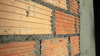 Spread cement on bricks, Brick wall