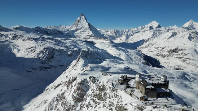Snowy ski resort on mountains in Gornergrat Railway during Winter