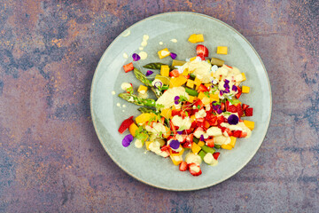 Yummy fruit salad with asparagus.