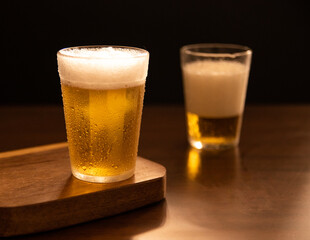 American cup with Beer on wooden table