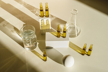 Medical ampoules close up. Many ampoules. Glass ampoules on the table. Scattered ampoules with...
