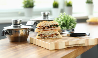 Close-up of delicious sandwiches with mixed stuffing. Fast food and calories. Unhealthy eating....