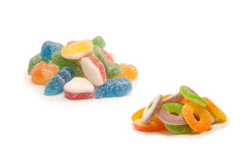 Assorted gummy candies isolated on a white background. Top view.
