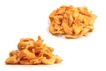 Dried melon slices isolated on a white background.