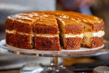 A close up of a cake for sale, with a shallow depth of field