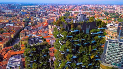 Aerial view of ecological skyscrapers with many trees on each balcony. Bosco Verticale. Modern...
