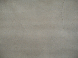 The texture of coarse gray paper with creases for the design and background