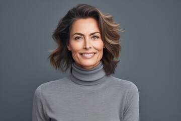 Portrait of a blissful woman in her 40s wearing a classic turtleneck sweater against a soft gray background. AI Generation