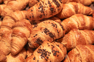 Close-up, croissants on a counter in a supermarket.