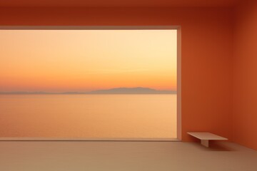  an empty room with a bench in the middle of the room and a view of a large body of water from the window of a room with an orange walls.