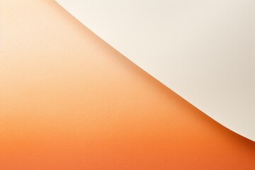  a close up of an orange and white wall with a cell phone in the middle of the wall and an orange and white wall in the middle of the wall.