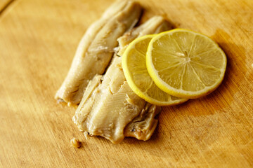 Herring in oil with lemons. 