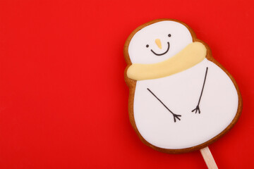 Snowman Gingerbread Cookie Pop on red background