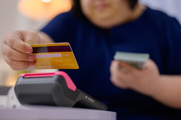 Close-up of credit card and online shopping at home with credit card Financial business concept with online shopping with cash or credit card