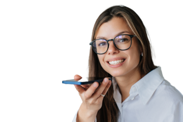 hispanic girl in white shirt holding phone recording audio message looks at camera broad smiling against transparent background. Successful young entrepreneur talks by cell phone using microphone