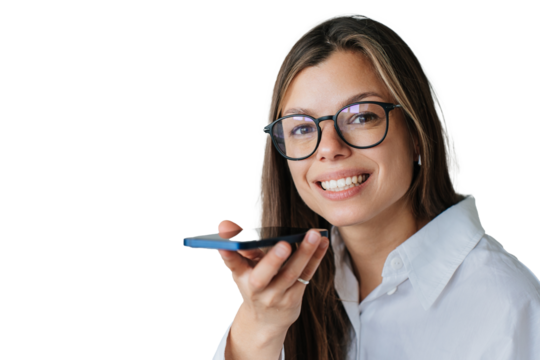 hispanic girl in white shirt holding phone recording audio message looks at camera broad smiling against transparent background. Successful young entrepreneur talks by cell phone using microphone