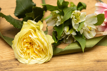 Floristry. Flowers. Yellow bouquet of roses, soft focus.