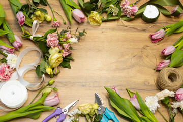Floristry. Layout of cut flowers. Tools and accessories for making a bouquet.