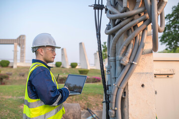 Telecommunication engineers work at cell towers for 5G cell phone signals,Network tower maintenance...