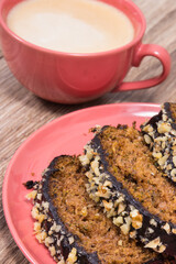 Fresh baked pastry made of zucchini and cup of white coffee. Delicious dessert