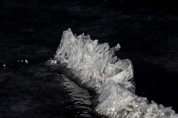 Naturally occurring winter ice sculptures and formations on Creve Couer Lake in St. Louis Missouri 