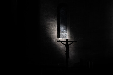 Christian cross silhouette in a church in Viterbo, Italy - obrazy, fototapety, plakaty