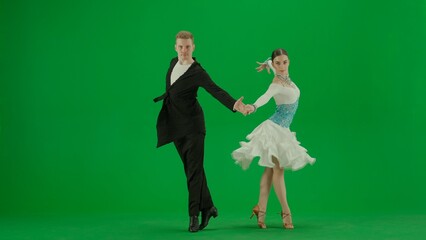 Elegant Ballroom Dance Couple in Action chroma key.