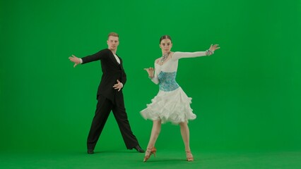 Elegant Ballroom Dance Couple in Action chroma key.